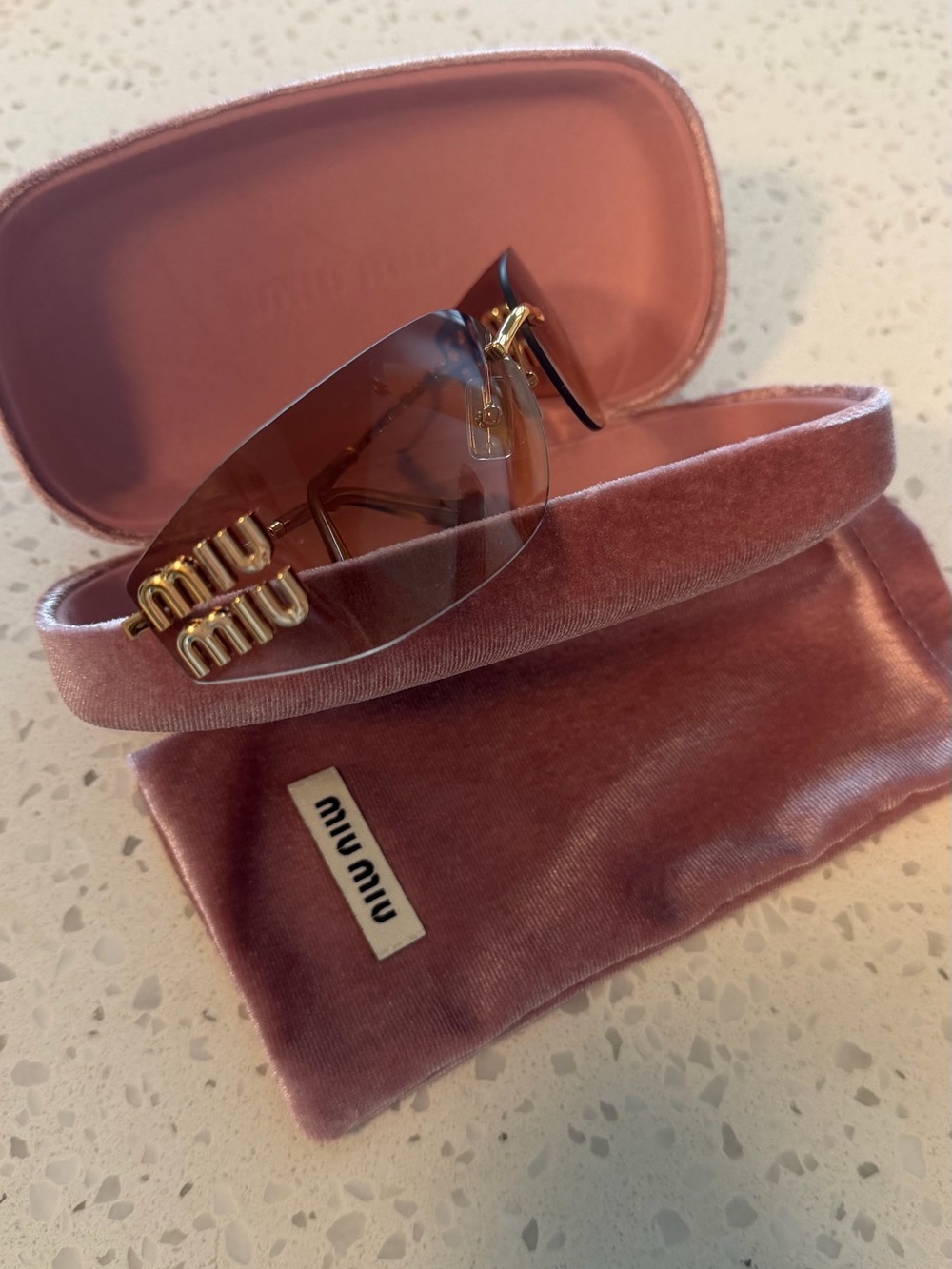 Miu Miu Pink Gradient Rimless Sunglasses with Gold Logo Temples